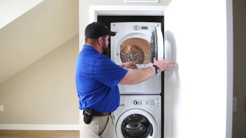 Man Inspecting and Securing the Dryer Door