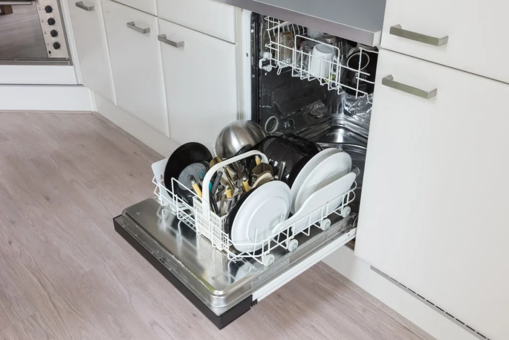opened overloaded dishwasher