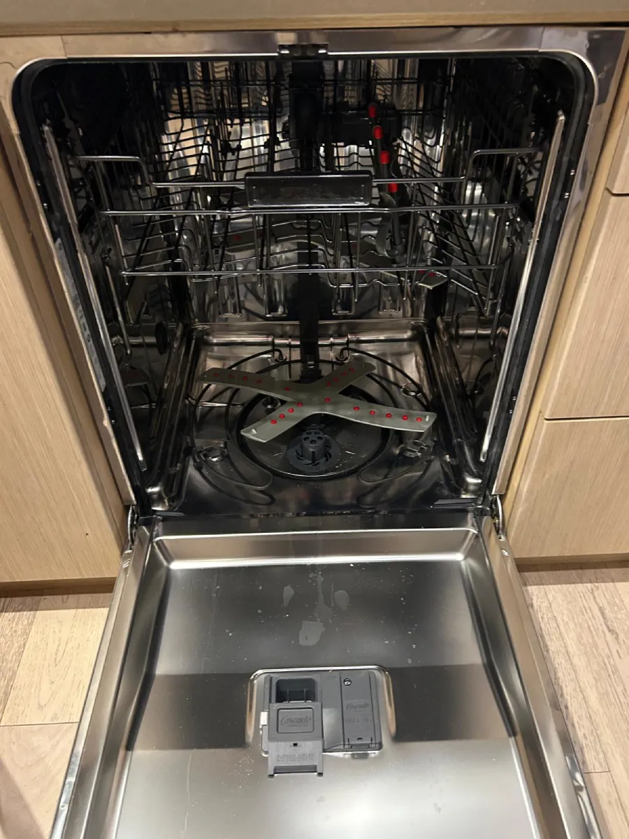 Dishwasher spray arm replaced
